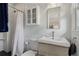 Clean bathroom with white vanity, shower, and updated fixtures at 2481 Brookdale Dr, Atlanta, GA 30345