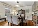 Bright dining room features a dark wood table with six light-grey chairs at 2481 Brookdale Dr, Atlanta, GA 30345