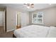 Comfortable bedroom with a queen-size bed and large window at 3210 Garmon Oak Trl, Lawrenceville, GA 30044