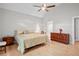 Bright bedroom featuring a king-size bed and ample natural light at 3210 Garmon Oak Trl, Lawrenceville, GA 30044