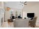 Living room with vaulted ceiling, hardwood floors, and fireplace at 3210 Garmon Oak Trl, Lawrenceville, GA 30044