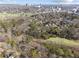 Aerial view showing home, neighborhood, and city skyline at 1992 Walthall Nw Dr, Atlanta, GA 30318