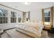 Large bedroom with plush bed, soft textiles and plenty of natural light at 1992 Walthall Nw Dr, Atlanta, GA 30318