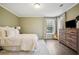 Bright bedroom with hardwood floors and neutral decor at 1992 Walthall Nw Dr, Atlanta, GA 30318