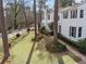 White two-story house with gray shutters and stone walkway at 1992 Walthall Nw Dr, Atlanta, GA 30318