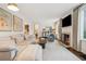 Light-filled living room with fireplace and comfortable seating area at 1992 Walthall Nw Dr, Atlanta, GA 30318