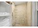 Modern shower with glass enclosure and built-in shelving at 1992 Walthall Nw Dr, Atlanta, GA 30318