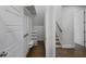 Under-stair closet with built-in shelving and drawers at 2071 Howard Circle Ne, Atlanta, GA 30307