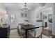 Bright dining room with chandelier and view into Gathering room at 2071 Howard Circle Ne, Atlanta, GA 30307