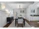 Elegant dining room features a chandelier and built-in cabinetry at 2071 Howard Circle Ne, Atlanta, GA 30307