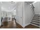 Bright entryway with staircase and views into the living room and kitchen at 2071 Howard Circle Ne, Atlanta, GA 30307