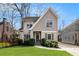 Charming two-story home with a manicured lawn at 2071 Howard Circle Ne, Atlanta, GA 30307