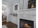 Modern fireplace with white marble surround and built-ins at 2071 Howard Circle Ne, Atlanta, GA 30307