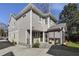 Two-story house with gray siding, stone accents, and patio at 2071 Howard Circle Ne, Atlanta, GA 30307