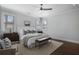 Spacious main bedroom with hardwood floors and ceiling fan at 2071 Howard Circle Ne, Atlanta, GA 30307