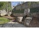 Outdoor stone fireplace and patio area at 2071 Howard Circle Ne, Atlanta, GA 30307