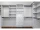 Large walk-in closet with ample shelving and drawers at 2071 Howard Circle Ne, Atlanta, GA 30307