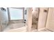 Bathroom features a soaking tub and a walk-in shower at 213 Cades Ct, Mcdonough, GA 30252