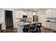 Kitchen with island, stainless steel appliances, and white cabinets at 213 Cades Ct, Mcdonough, GA 30252