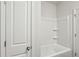 Bathroom with tub and shower at 3921 Brushy St, Powder Springs, GA 30127