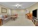 Spacious basement with sectional sofa and a piano at 4760 Green Summers Dr, Cumming, GA 30028