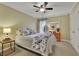 Cozy bedroom with a queen-size bed and a floral comforter at 4760 Green Summers Dr, Cumming, GA 30028