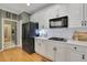 Modern kitchen with stainless steel appliances and white cabinets at 4760 Green Summers Dr, Cumming, GA 30028