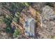 Aerial view of house and surrounding wooded area at 3160 Hathaway Ct, Atlanta, GA 30341