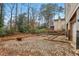Backyard area with gravel and scattered construction materials at 3160 Hathaway Ct, Atlanta, GA 30341