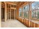 New construction bedroom with large windows and framing at 3160 Hathaway Ct, Atlanta, GA 30341