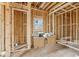New home construction bedroom framing, showing an open space with window at 3160 Hathaway Ct, Atlanta, GA 30341