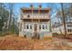 Two-story home with unfinished construction, large windows, and a spacious unfinished second-story balcony at 3160 Hathaway Ct, Atlanta, GA 30341
