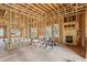 Open living room showcasing a fireplace, currently under construction at 3160 Hathaway Ct, Atlanta, GA 30341