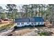 Ranch home with detached barn and large yard at 418 Hillview Rd, Hampton, GA 30228