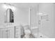 Elegant bathroom with white walls, a white vanity, and a walk-in shower at 103 Arbor Oaks Dr, Canton, GA 30115