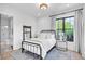 Charming bedroom with metal bed frame and ensuite bathroom at 103 Arbor Oaks Dr, Canton, GA 30115