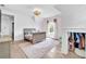 Light and airy bedroom with a gray bed frame and pink striped wall at 103 Arbor Oaks Dr, Canton, GA 30115