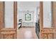 Bright laundry room with farmhouse sink, built-in cabinets, and washer/dryer at 103 Arbor Oaks Dr, Canton, GA 30115