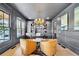 Elegant home office with built-in shelving and hardwood floors at 103 Arbor Oaks Dr, Canton, GA 30115