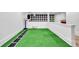 Basement playroom with turf flooring, basketball hoop, and soccer goal at 103 Arbor Oaks Dr, Canton, GA 30115