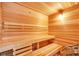 Traditional wood sauna with two benches and a bucket of stones at 103 Arbor Oaks Dr, Canton, GA 30115