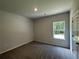 Simple bedroom with carpet, one window, and neutral walls at 11045 Shadow Creek Ter, Hampton, GA 30135