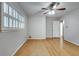 Hardwood floors and neutral walls in this bedroom at 1833 Queens Way, Chamblee, GA 30341