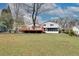 House back view with deck and yard at 1833 Queens Way, Chamblee, GA 30341