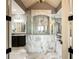 Luxurious bathroom with marble shower and double vanity at 89 Somerset Ln, Cartersville, GA 30121