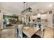 Kitchen and dining area with farmhouse table and an open concept design at 1121 Red Oak Ln, Loganville, GA 30052