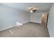 Spacious bedroom with carpeted floors and ceiling fan at 140 Tye St, Stockbridge, GA 30281