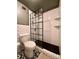 Small bathroom with a black frame glass shower and hexagon tile floor at 2479 Peachtree Ne Rd # 1410, Atlanta, GA 30305