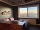 Bedroom with city views and wood dresser at 2479 Peachtree Ne Rd # 1410, Atlanta, GA 30305