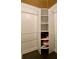 Spacious closet with built-in shelving and hanging rods at 2479 Peachtree Ne Rd # 1410, Atlanta, GA 30305